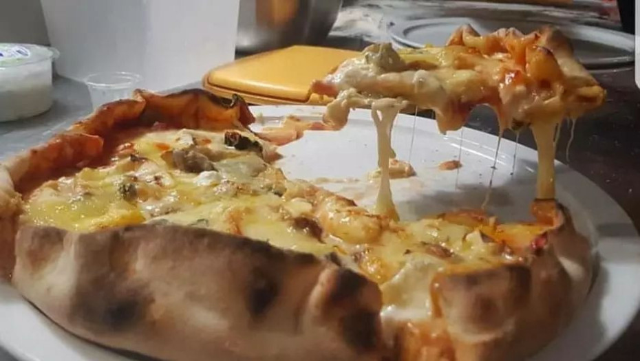 Βίντεο: Πώς ένας Γάλλος σεφ κατέρριψε το ρεκόρ Γκίνες με μία πίτσα